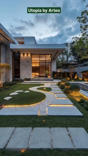 #Modern Landscape Reel by @arteo_luxury - Luxury landscape by Arteo!
This landscape is where structure meets serenity. The flowing path, artfully edged with pebbles and soft lighting, guides