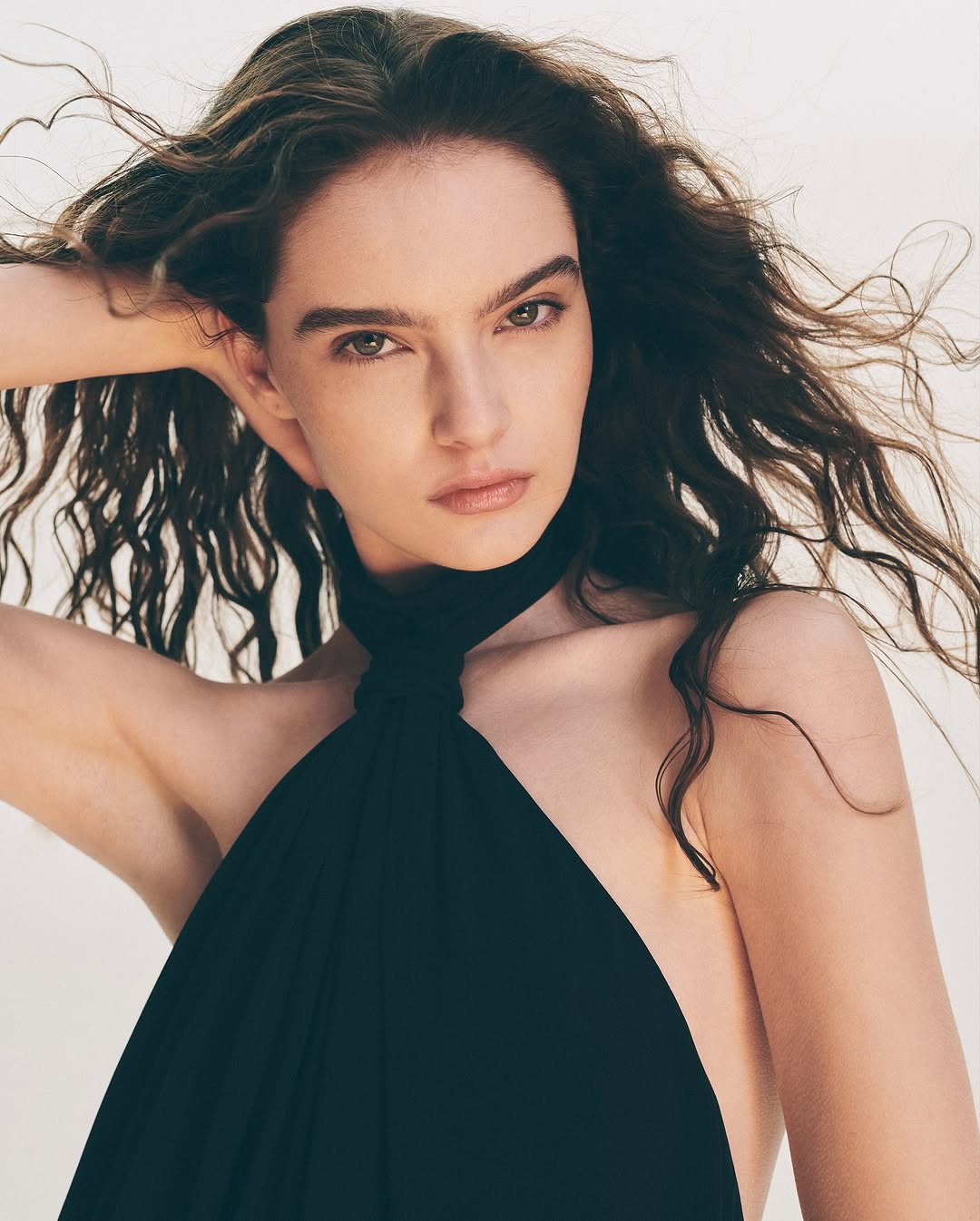 the khy knotted halter gown drops tomorrow exclusively on khy.com