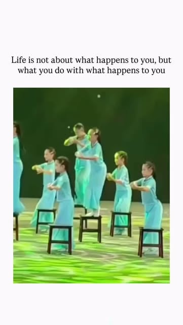 #Quote Reel by @s0ci0n - The video depicts a young girl in a July 2025 Chengdu synchronized chair dance competition falling after her stool collapses, yet she immediately rise