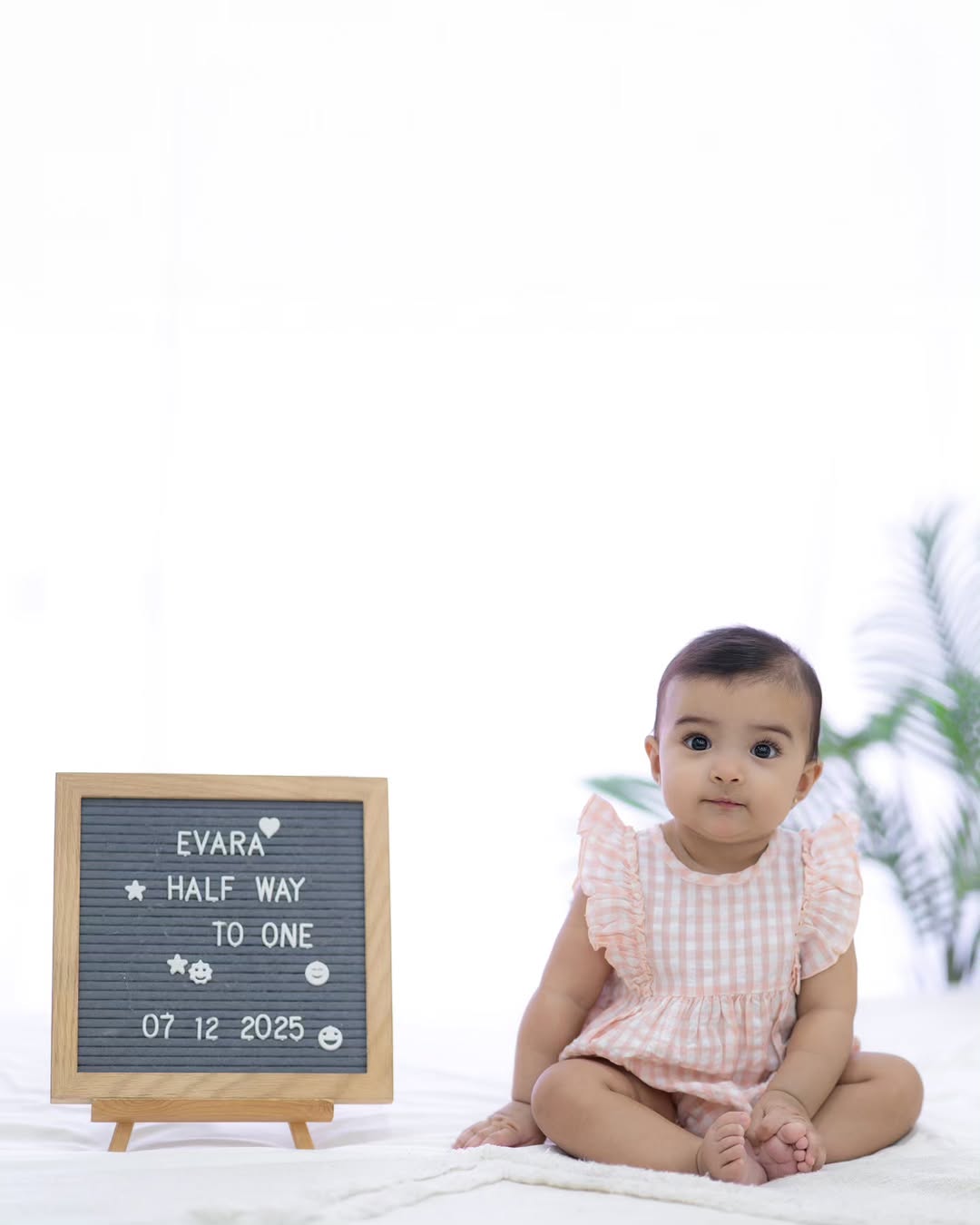 Halfway to one and already running the show. ✨ Don’t let that innocent face fool you! she’s a professional tiny troublemaker in the making! She absolutely loved her first photoshoot, and honestly? Th