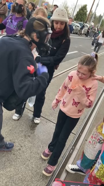 #Girl Reel by @thedumbrunner (verified account) - I recorded this today, in Portland, Oregon, at a huge march to the ICE facility in SW. The crowd was full of cyclists (including me) who had ridden th