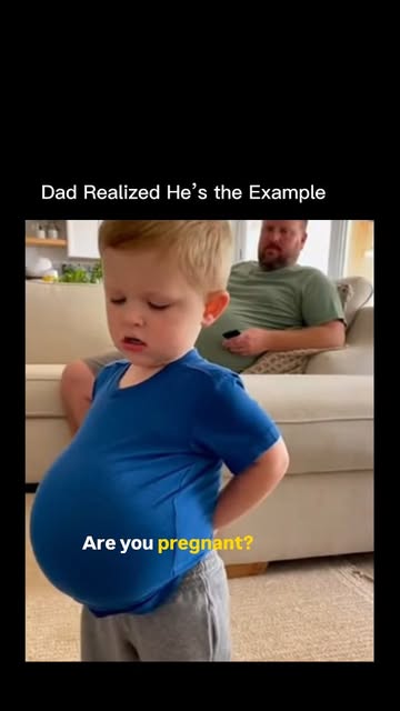 #Fyp Reel by @wildx.ai - This post shows a perfectly timed moment where a dad suddenly realizes he's the example his kid is copying-watching his child mimic his gestures, atti