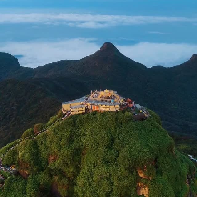 People have been climbing this mountain for centuries. Have you been here? ⛰️🇱🇰 . . . . [adam’s peak, sri pada, sri lanka travel, hiking sri lanka, drone footage, dji mini 4 pro, cinematic drone, mo