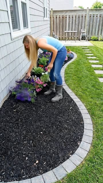 #Simple Backyard Landscaping Ideas Reel by @modernconstructiondiy - Creating a Cozy Wallside Garden - Simple Backyard Transformation