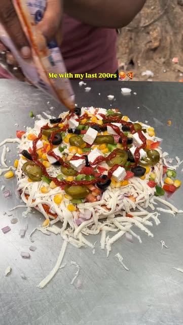 #Blogger Reel by @aashitaeats (verified account) - Street style pizza ki baat he kuch or hai!! 😍🍕

[ Pizza, Pizza lover, street style pizza, street food, delhi food blogger, trending reels, viral ]

