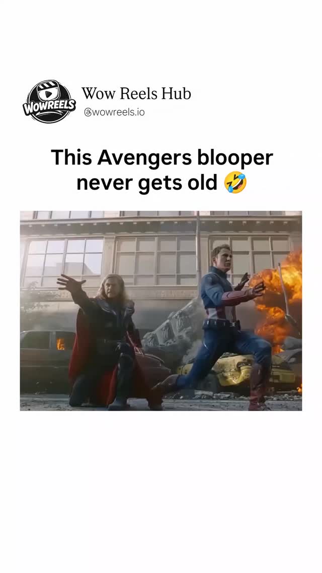 In a chaotic urban battle scene from "The Avengers," Captain America, clad in his iconic blue suit with a red-and-white shield, hurls his weapon toward Thor, who stands ready in his red cape and armor