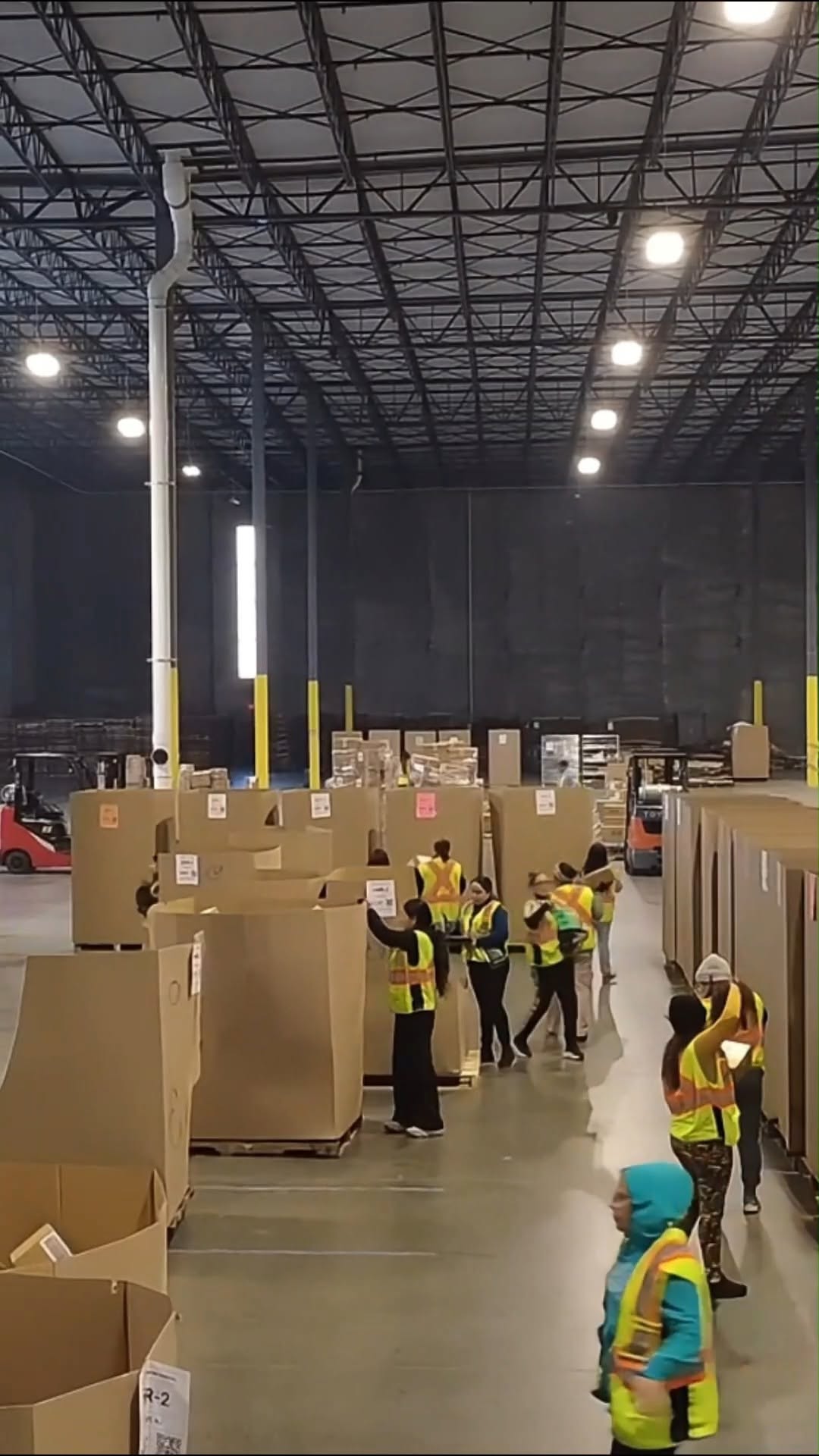 Our sorting team at BroadRange Logistics. To an outsider it might look like chaos, but through our processes and organization, we are able to deliver to our customers on-time and accurately.