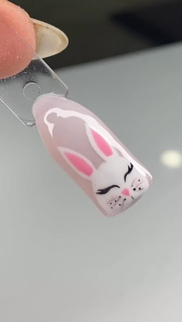 #Nail Art Design Reel by @_nailedbyd_ - Easter is right around the corner… so obviously we needed a cute bunny nail 🐰🌸
This little bunny comes together in under 30 seconds but the details