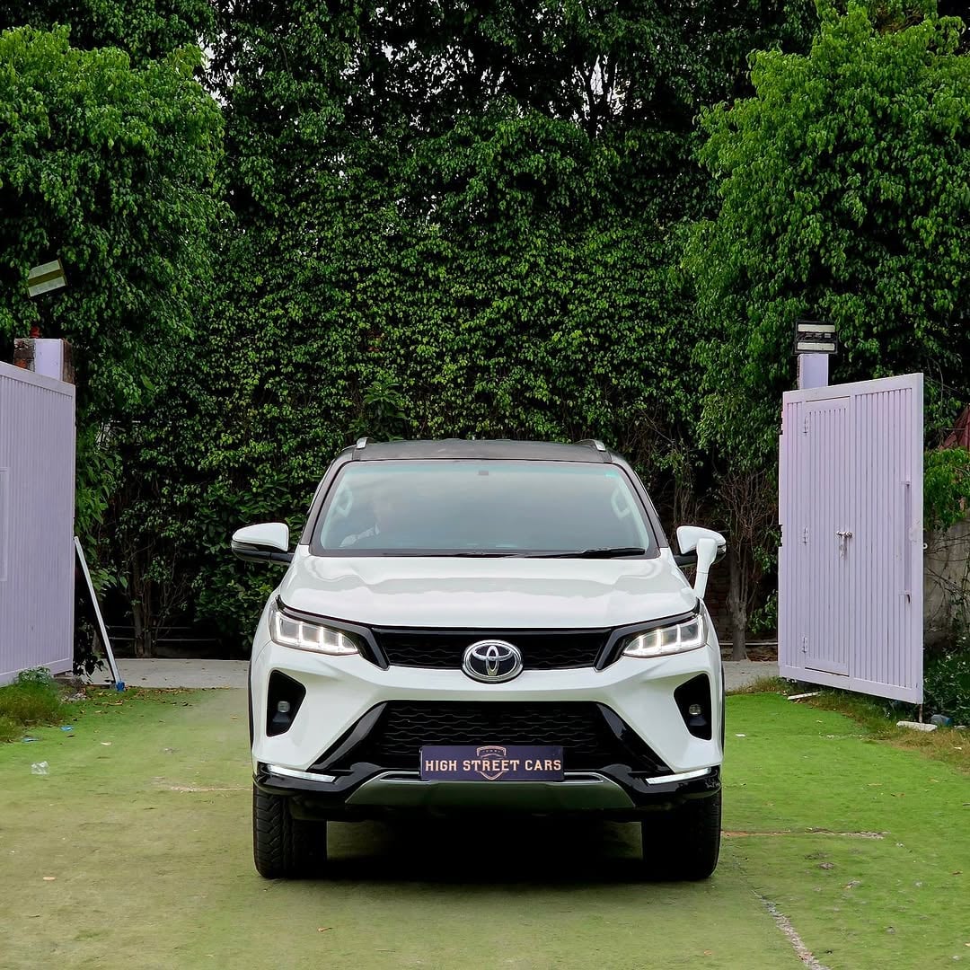 Toyota Fortuner 4×2 Legender kit Installed Diesel Variant Automatic Transmission White Color Dualtone Interior Alloy Wheels 7 Seater SUV Showroom Condition 2019 Model DL Registration 62000 Driven 23.9