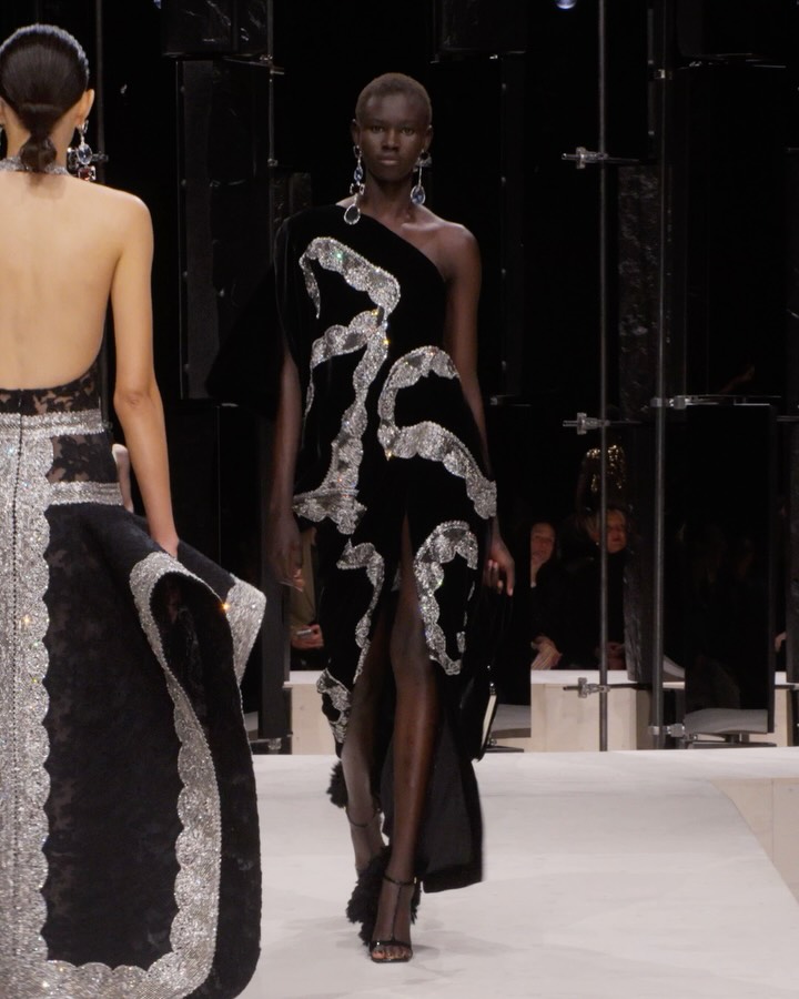 Rejoice wears a bow drape velvet dress with ribbon embroidery, rainbow crystal drop earrings and velvet embroidered bow clutch. Givenchy by Sarah Burton Styling Camilla Nickerson Casting @jesshalle