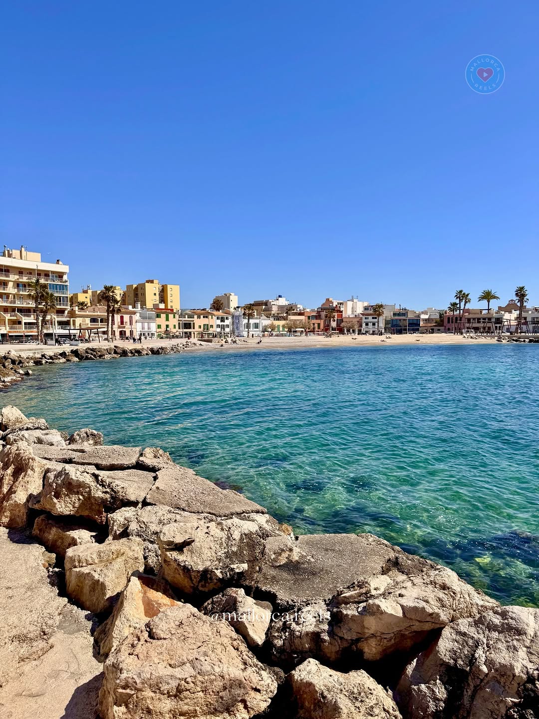 This is . . 👇🏼 . . 📍Portixol, Mallorca 🇪🇸 ⭐️Find the best discounts island-wide for car/boat/yacht rentals & activities on our profile Golden daylight floods Platja des Portitxolet in Mallorca