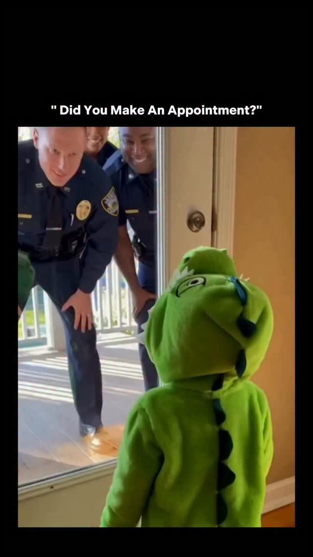 This 10-second clip shows a toddler answering the door to police officers and confidently refusing to open it, asking if they have an appointment like he’s running a strict office. The humor lands in