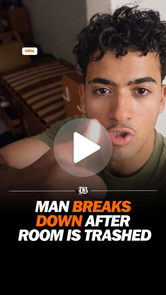 The clip shows a young man inside a military barracks room, recording a shocking scene—clothes, bags, and personal items thrown everywhere, beds stripped down to bare frames, drawers left open, and ev