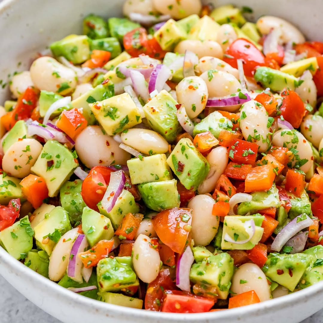 Avocado Bean Salad My neighbor was shocked that this recipe was gone first at her "picky family" gathering last week! ⭐️⭐️⭐️⭐️⭐️ Type "RECIPE" below in the comments, and I'll DM you the direct link